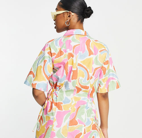 ASOS DESIGN short sleeve tie waist romper in marble print